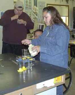 college students doing science experiment
