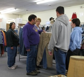 workers in Turtle Mountain store