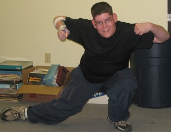 Youth from Turtle Mountain Flexing Muscles